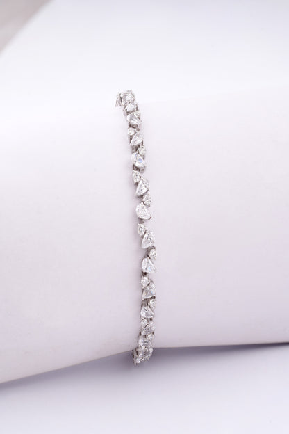 Elegant Pear-Cut Diamond-Style Tennis Bracelet – A Symphony of Sparkling Elegance