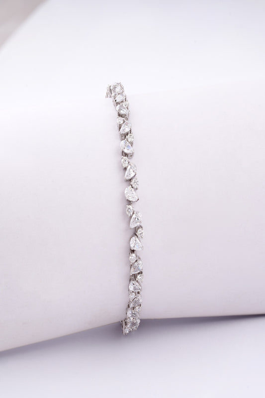 Elegant Pear-Cut Diamond-Style Tennis Bracelet – A Symphony of Sparkling Elegance
