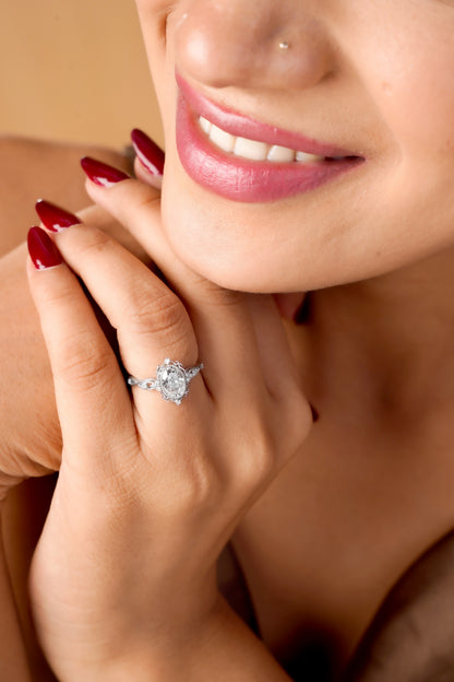 Oval Solitaire Ring with Intricate Side Detailing
