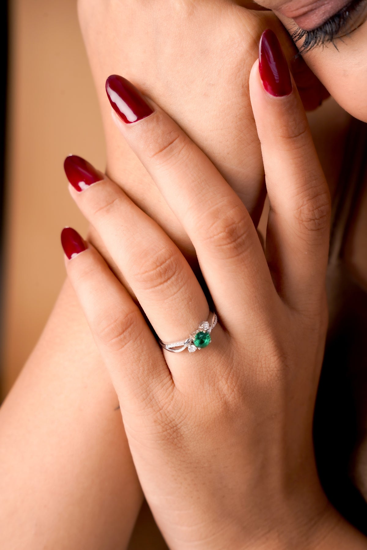 Emerald Green Oval Stone Ring with Sparkling Side Details