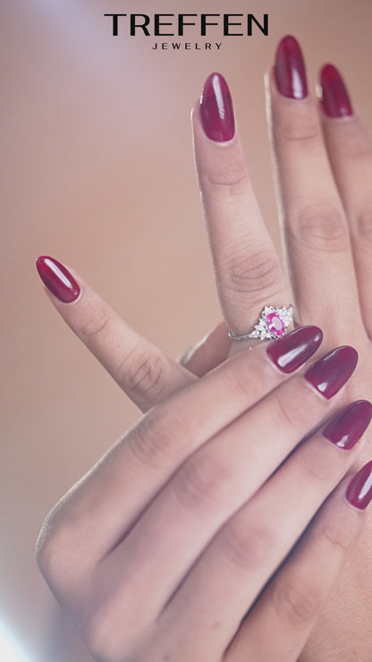Pink Oval Stone Halo Ring with Floral-Inspired Detailing